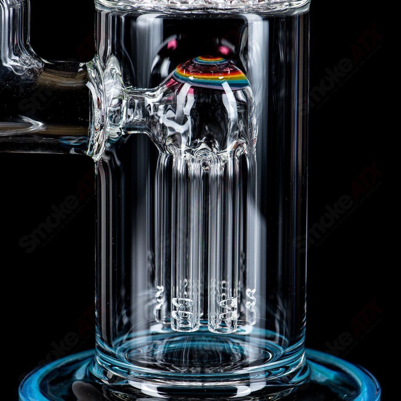 Toro 18mm 7/13 arm perc straight glass tube with worked sections for enhanced filtration and style.