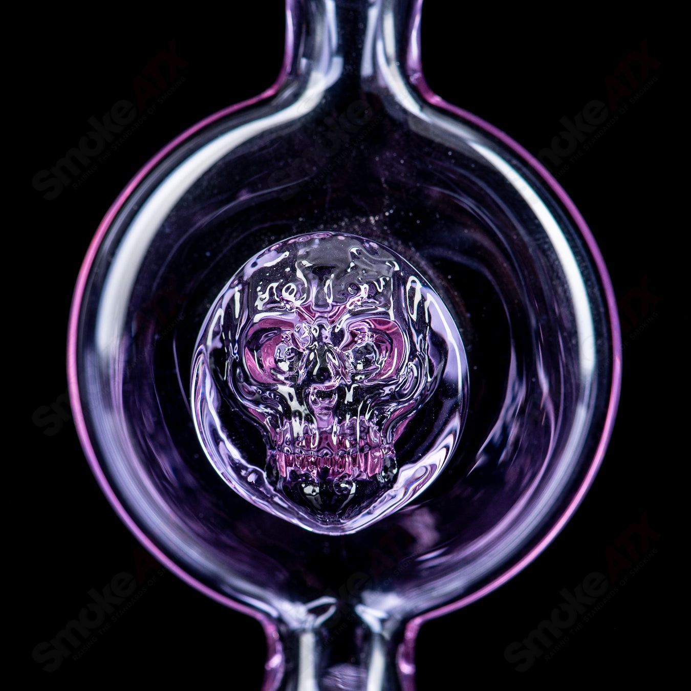 Lokee Glass 5.5-inch face rig concentrate rig with clear glass and intricate face design, for dabbing concentrates.