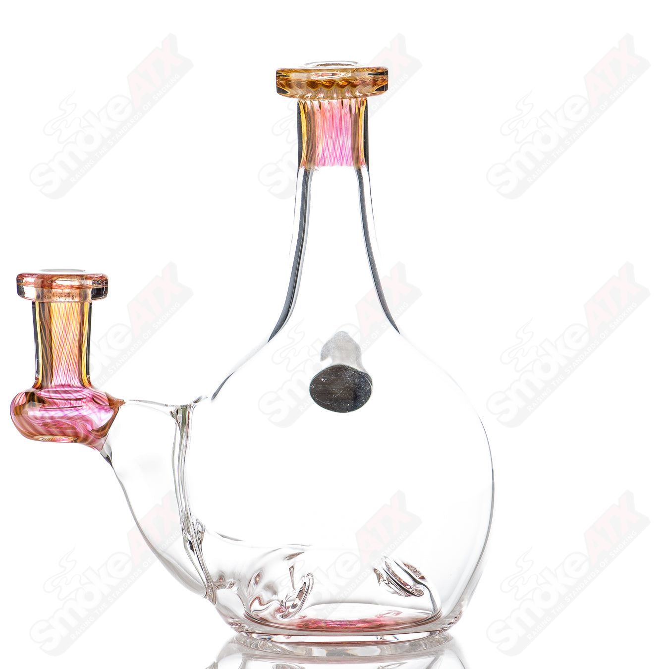 Glass concentrate rig by Dot Mark featuring a colorful blooper design, perfect for dabbing and concentrate use.