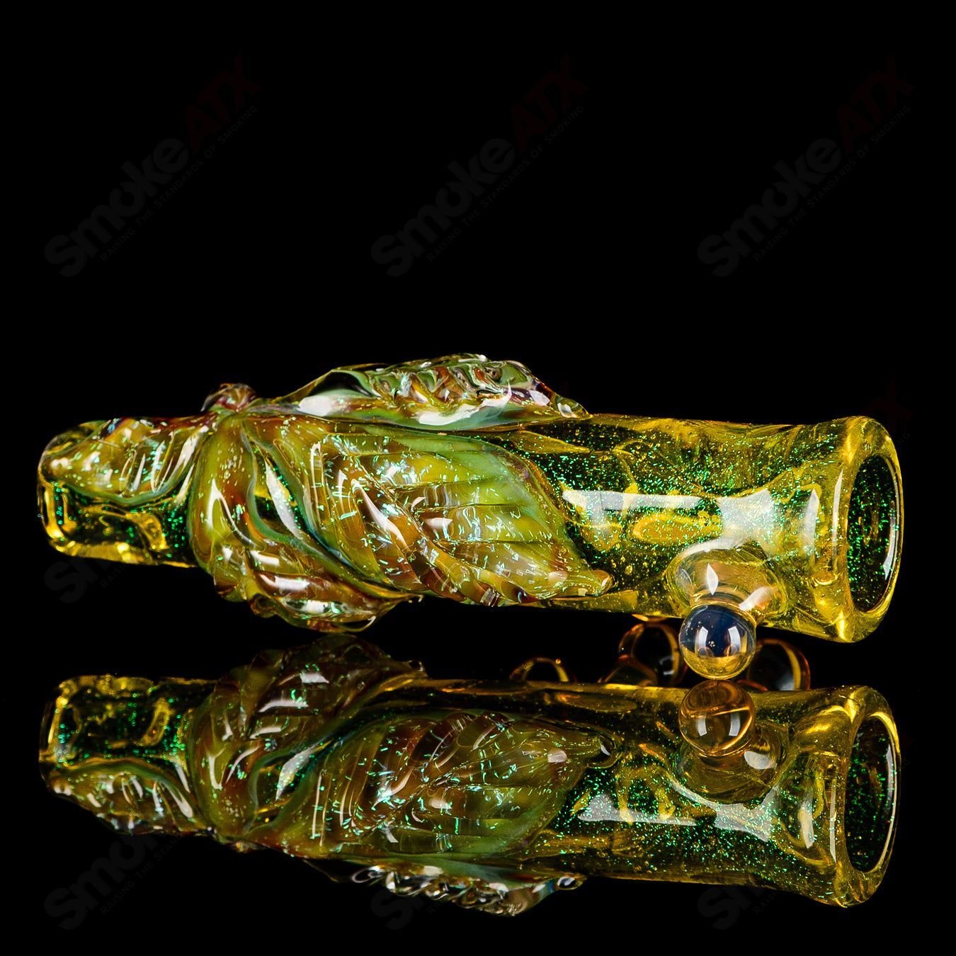Handheld Mr. Gray Chillum made of heady glass, featuring a sleek design and smooth glass finish for easy use.