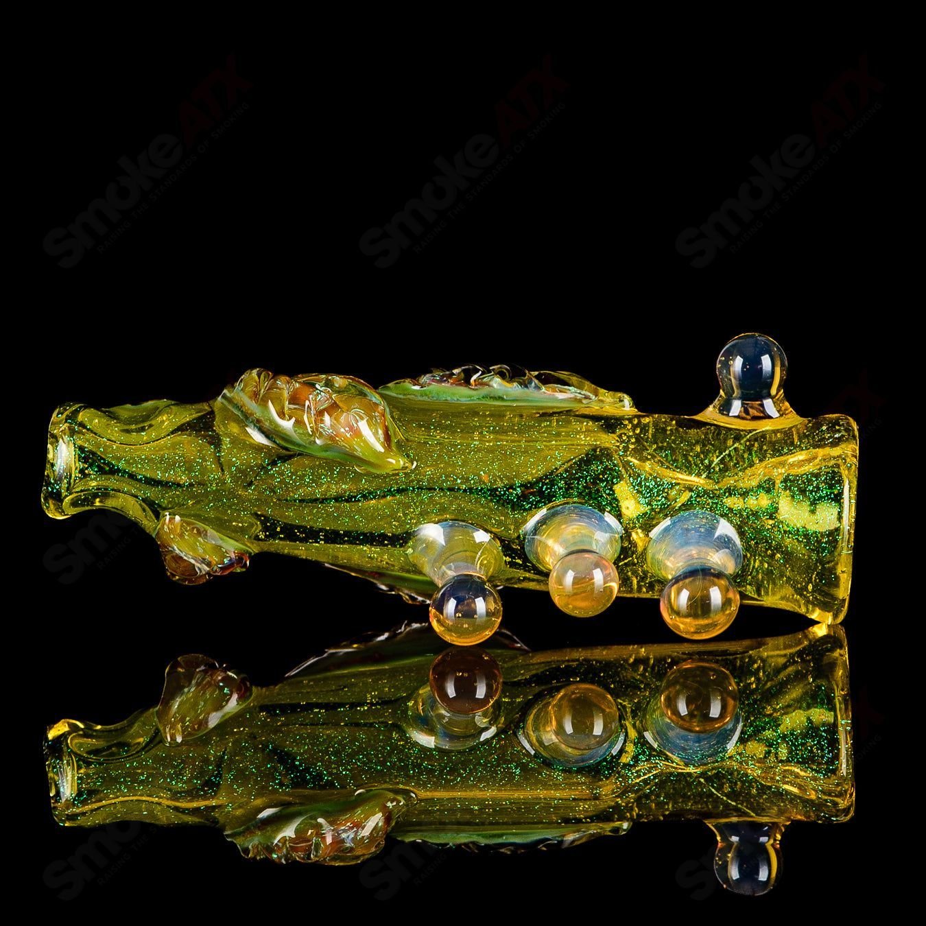 Hand pipe from Mr. Gray's Heady Glass collection, featuring the #1 Chillum with colorful glass accents and a compact design.