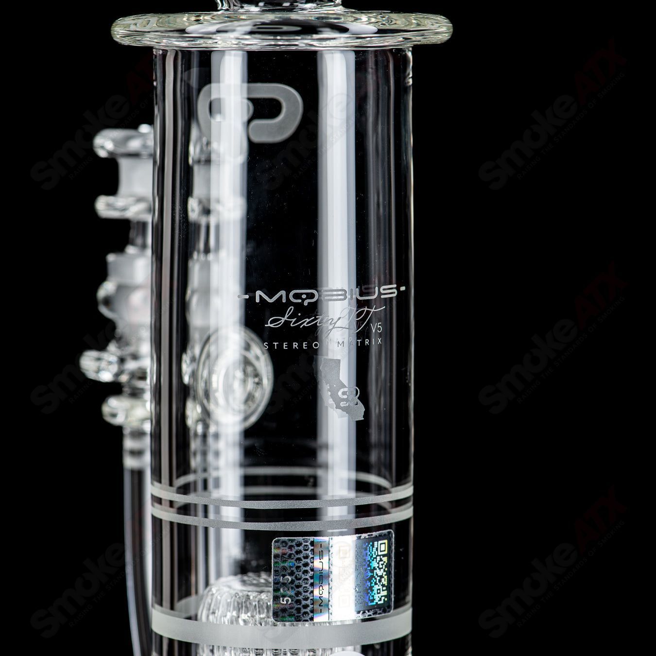 Mobius Cold Worked 60T V5 Stereo Matrix glass waterpipe with intricate design and clear glass construction.