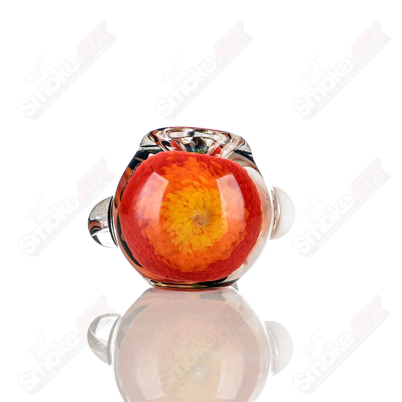 Color worked IO spoon hand pipe by Jeremy from Oregon featuring vibrant, artistic glasswork and a practical, ergonomic design.