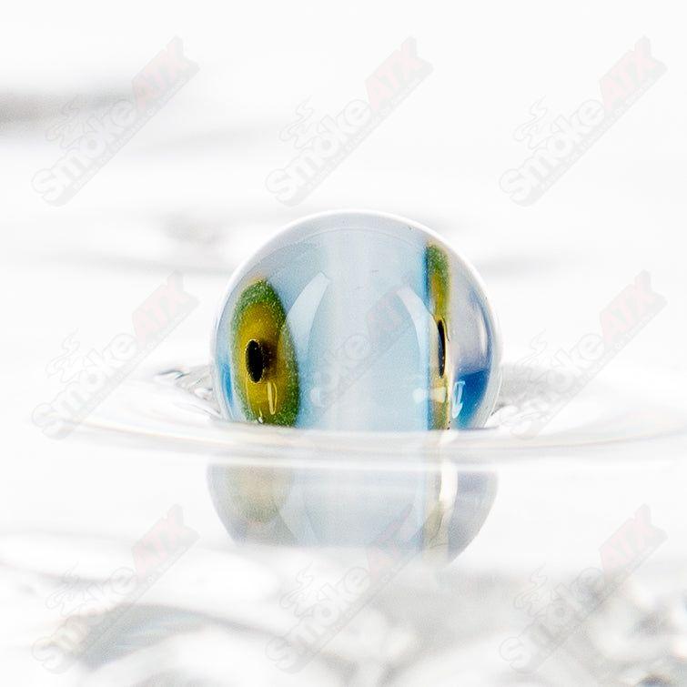 Glass pipe with a round eye ball pearl insert by Salt, featuring colorful heady glass with unique pearl details.