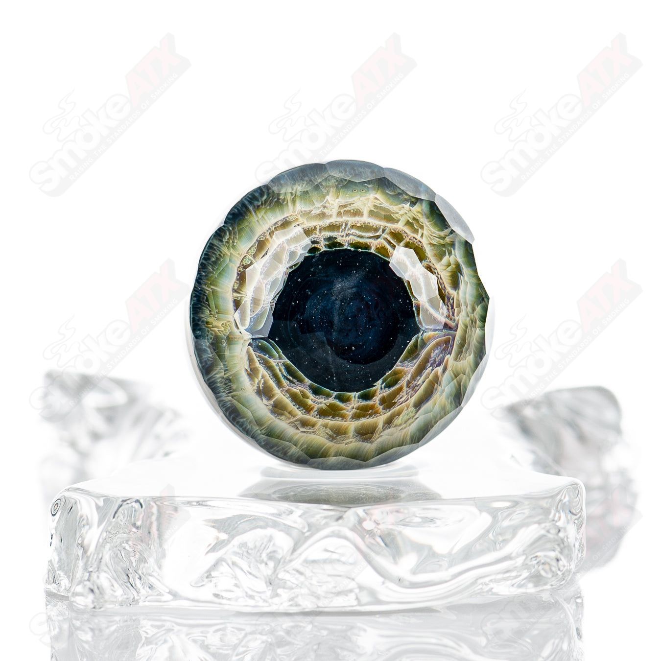 Faceted Eye Marble by Indo Glass, part of Fatal Facets Heady Glass marbles, featuring a detailed eye design and vibrant colors.