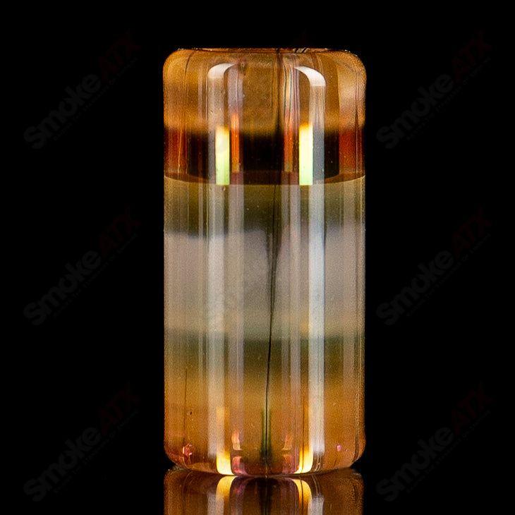 Fumed glass bead by Evan Shore featuring a swirling pattern and shimmering fumed effects, showcasing intricate craftsmanship.
