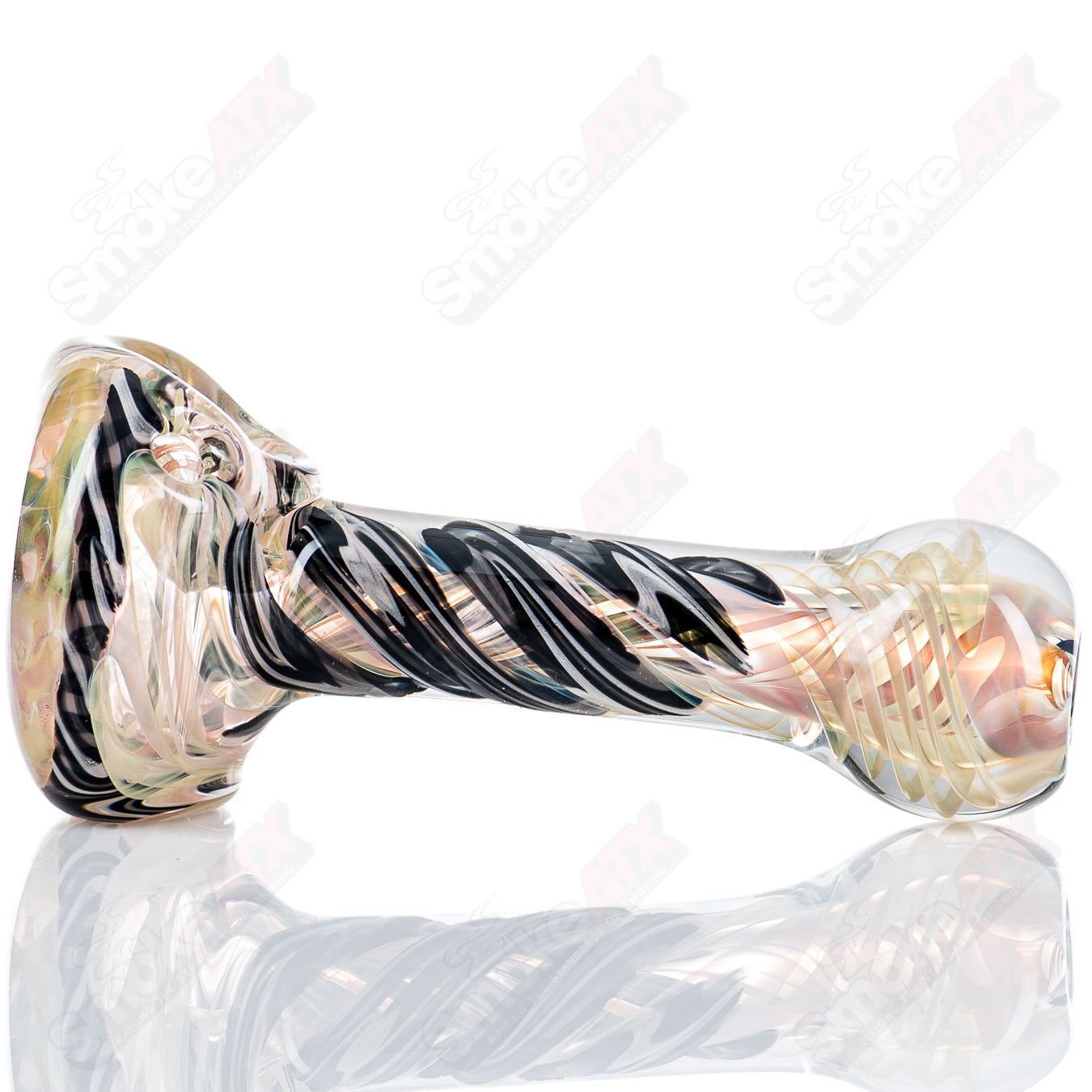 Fumed Reticello glass spoon pipe by Talent Glass Works, featuring intricate blue and white reticello patterns and clear glass accents.