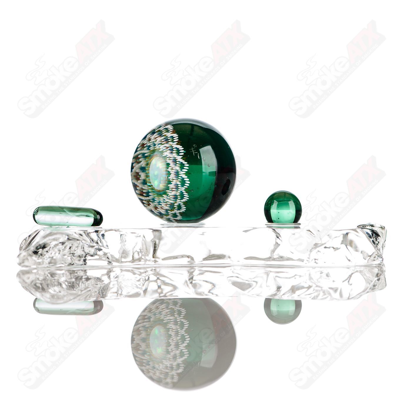 Colorful geometric marble from JH Glassworks Heady Glass collection, featuring intricate patterns and vibrant marble design.