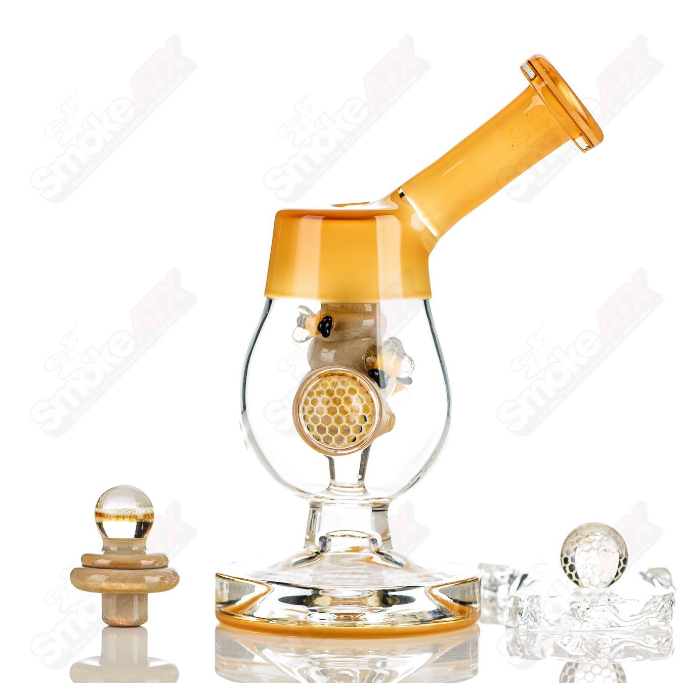 Joe P Glass Honeycomb Jammer heady glass bubbler with a honeycomb design and clear glass body.