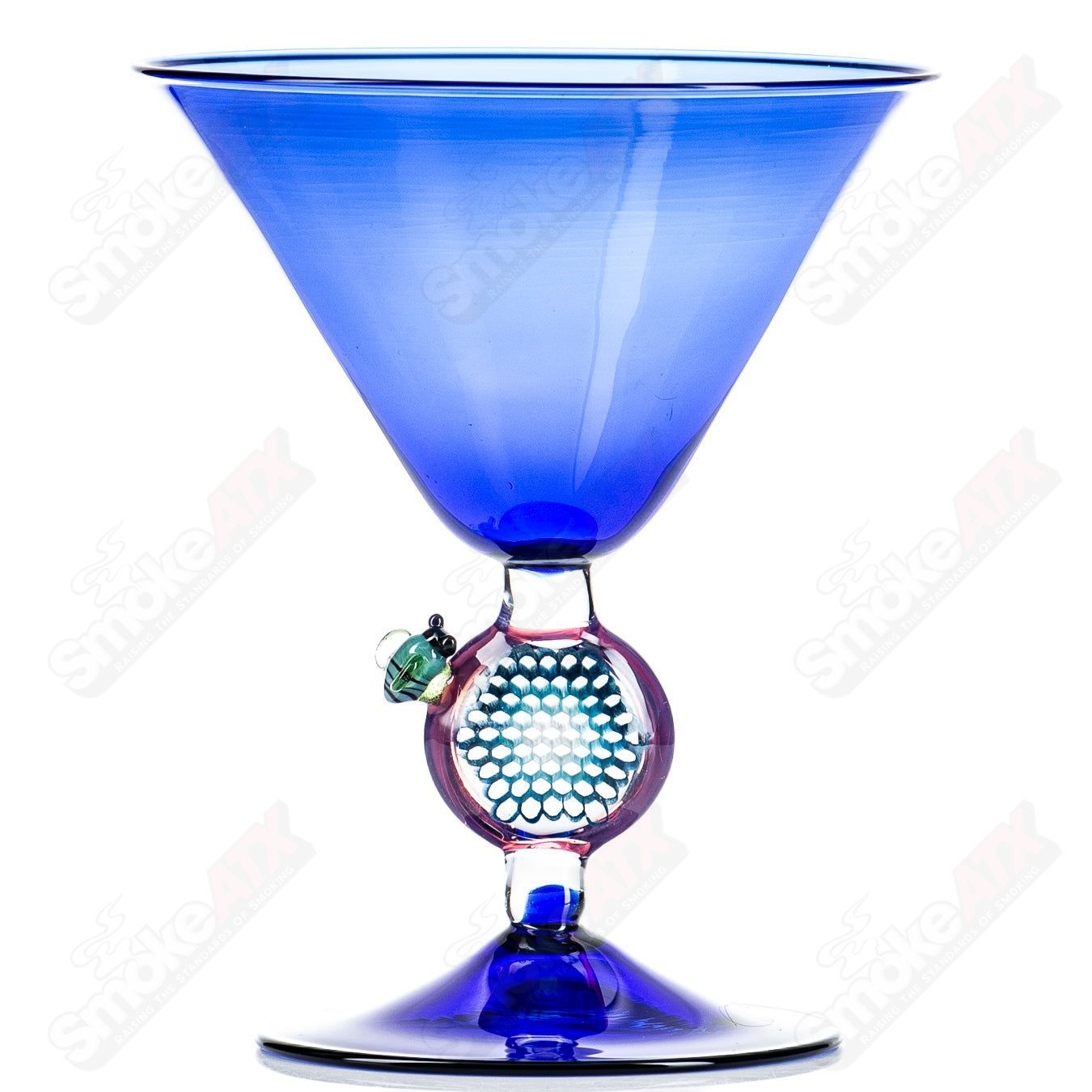Heady Glass Martini Honey Glass by Joe P Glass, a clear cup with honey-colored accents, designed for stylish cocktail servings.