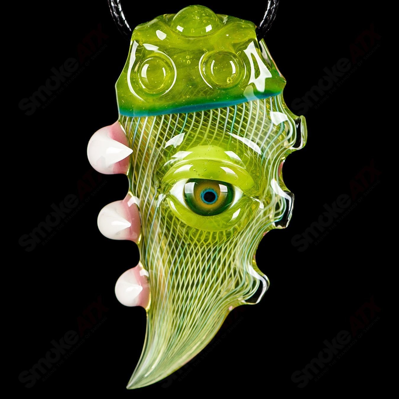 Salt Glass Dosa x Salt Glass pendant made of clear glass with colorful accents, designed as a stylish heady glass pendant necklace.