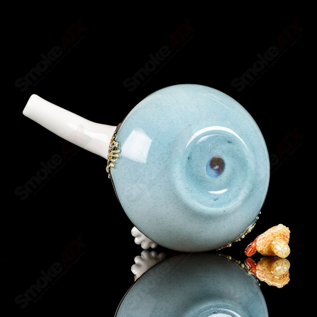 Dojo Glass Ramen Rig, a clear heady glass concentrate rig with intricate ramen noodle design, perfect for vaporizing concentrates.