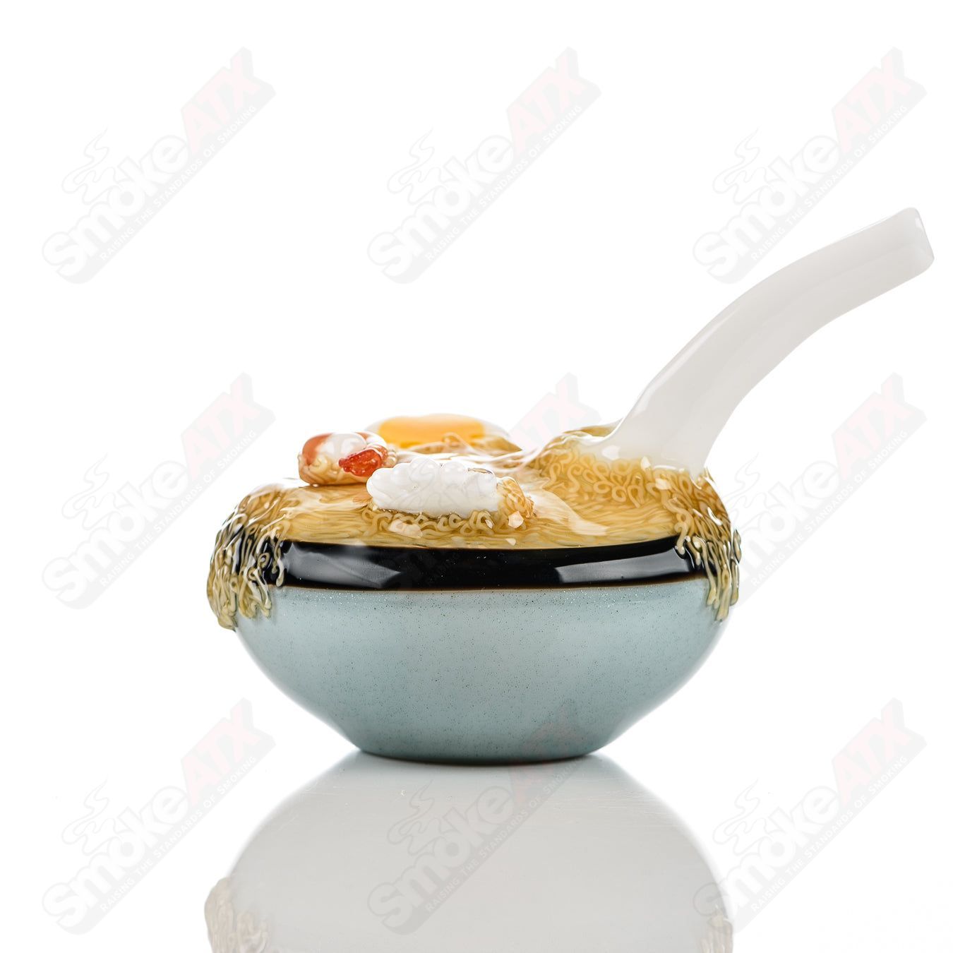 Dojo Glass Ramen Rig Heady Glass concentrate rig with colorful ramen noodle design and clear glass body for dabbing.