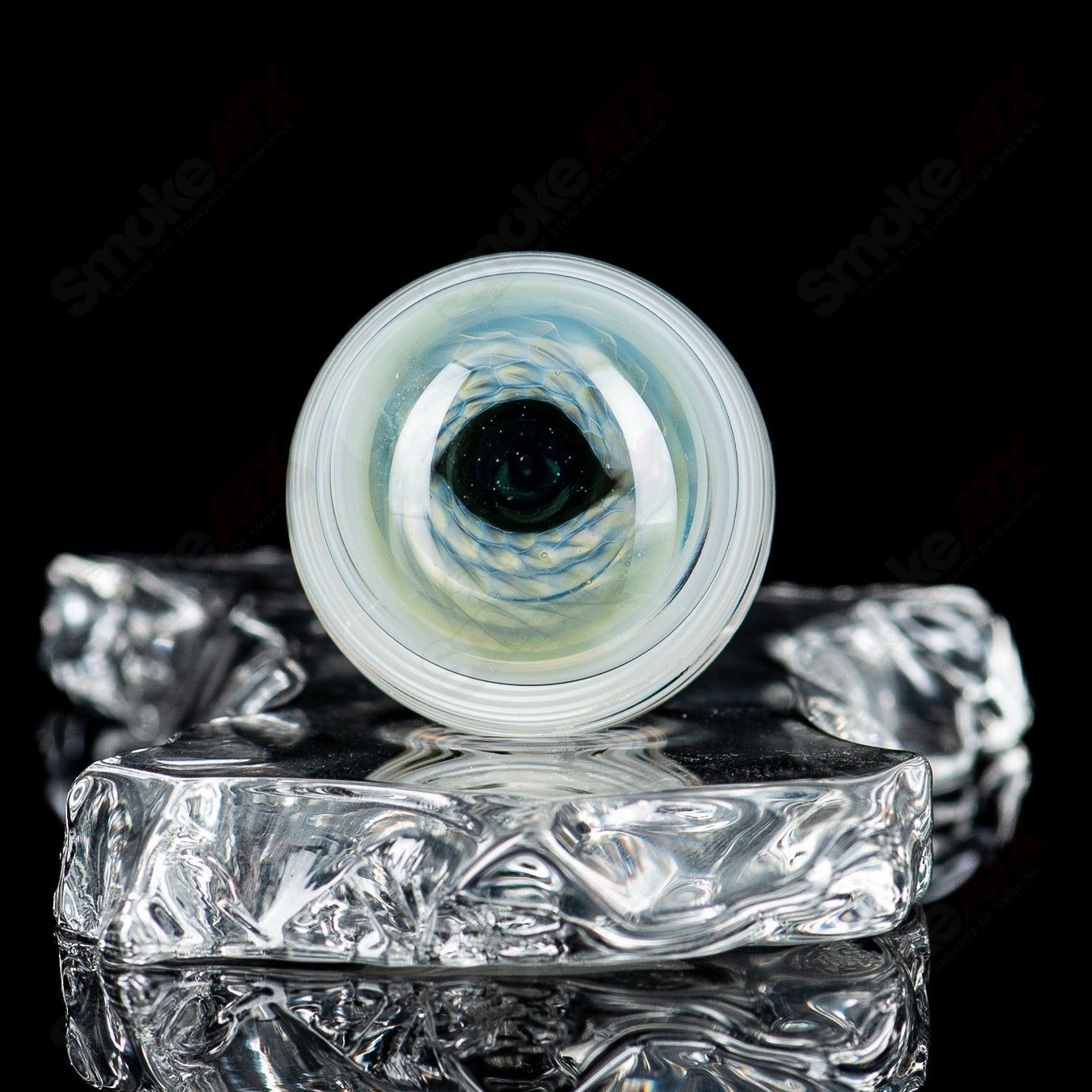 Indo Glass Skull Eye Mili Top Mib Heady Glass with colorful marble accents and detailed skull and eye design.