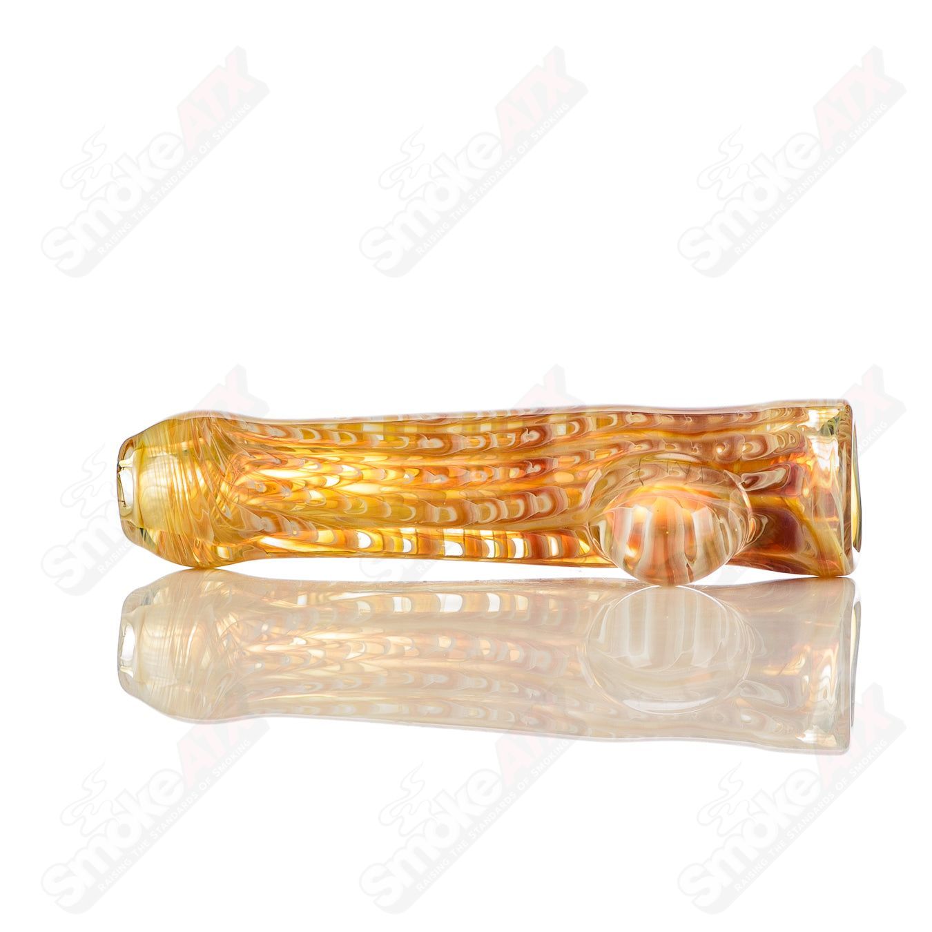 Transparent worked glass chillum with clear dot signature by JMK Glass, showcasing intricate glasswork and design.