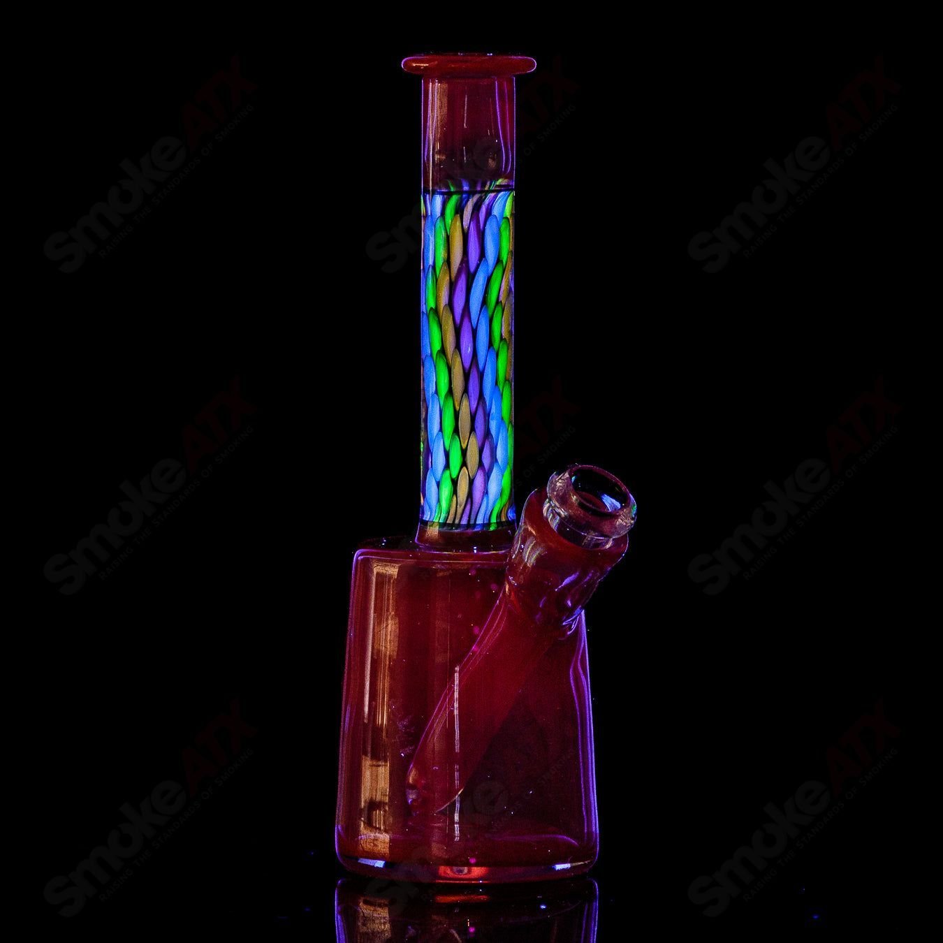 BCM Glass UV Mini Rig for concentrates, featuring colorful heady glass design and intricate glasswork.
