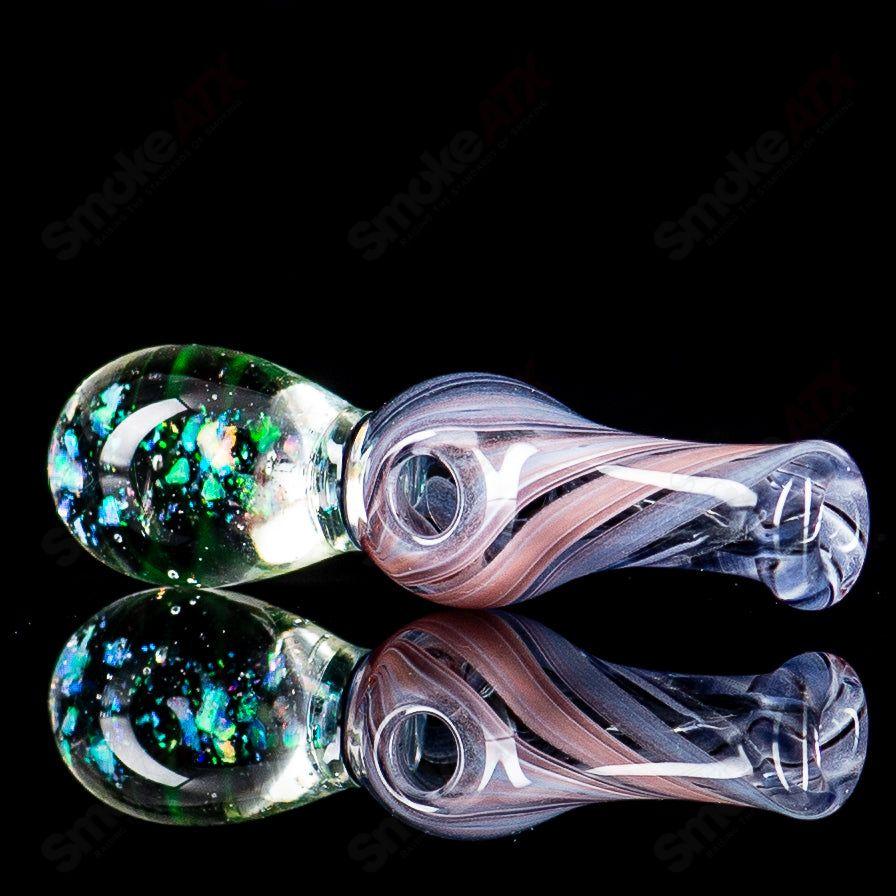 Colorful UV-illuminated Puffco Joystick heady glass top by Geoff Made Glass for Puffco devices, featuring intricate glass design.