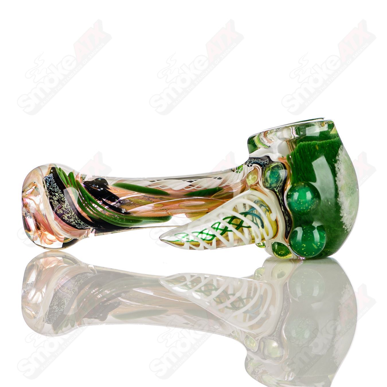 Colorfully worked IO spoon hand pipe by Jeremy from Oregon, featuring intricate 10-color designs and a smooth, rounded bowl.