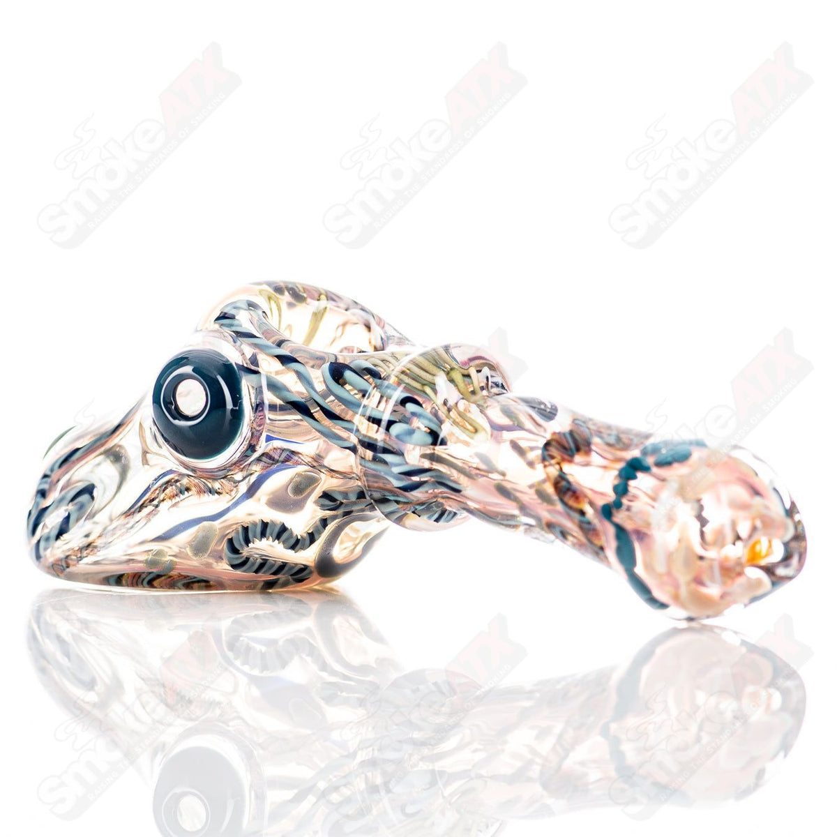 Glass hand pipe from Molten Imagination's ISO Montage Chaos Club series, featuring colorful, intricate designs on the surface.