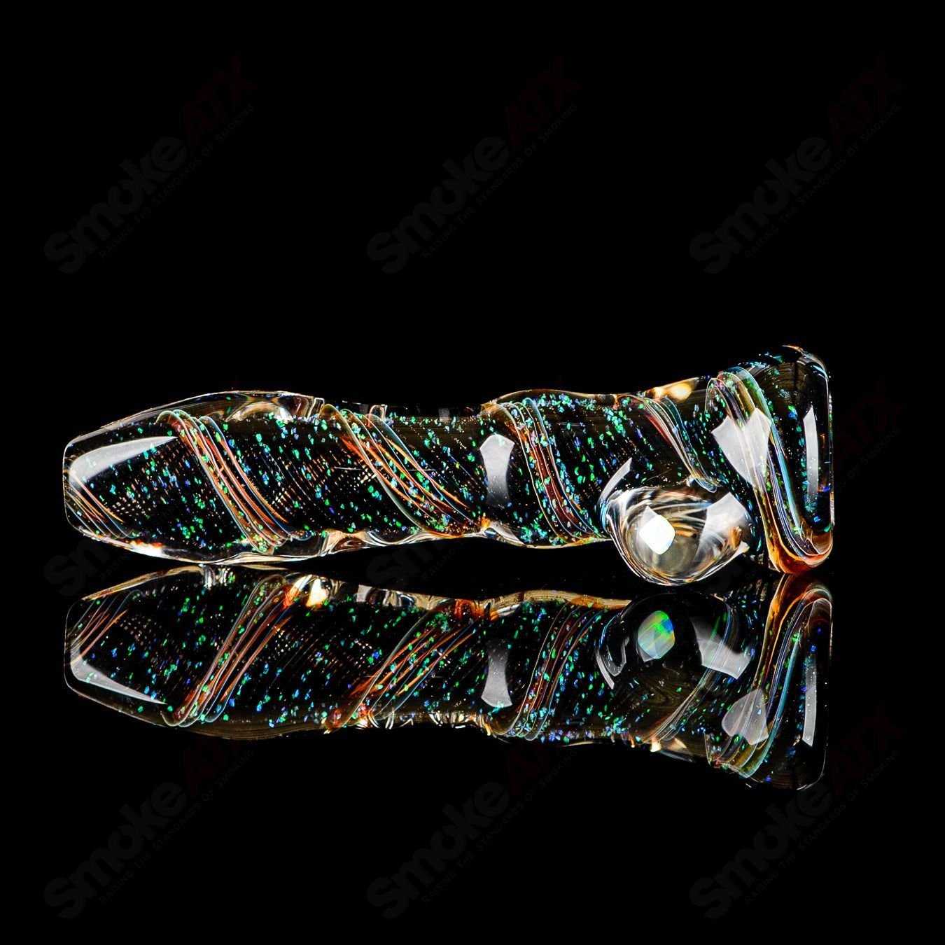 Glass chillum called #10 Opal Hitter by Rotational Science, featuring colorful opal accents and a sleek, cylindrical design.