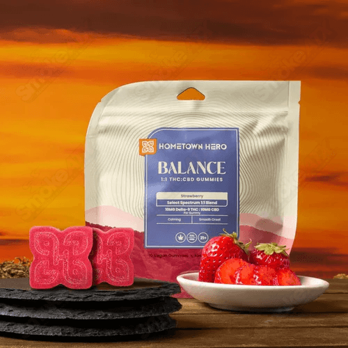 Hometown Hero Strawberry Spectrum D9 Gummies with 100mg THC, hemp edibles in a colorful package.