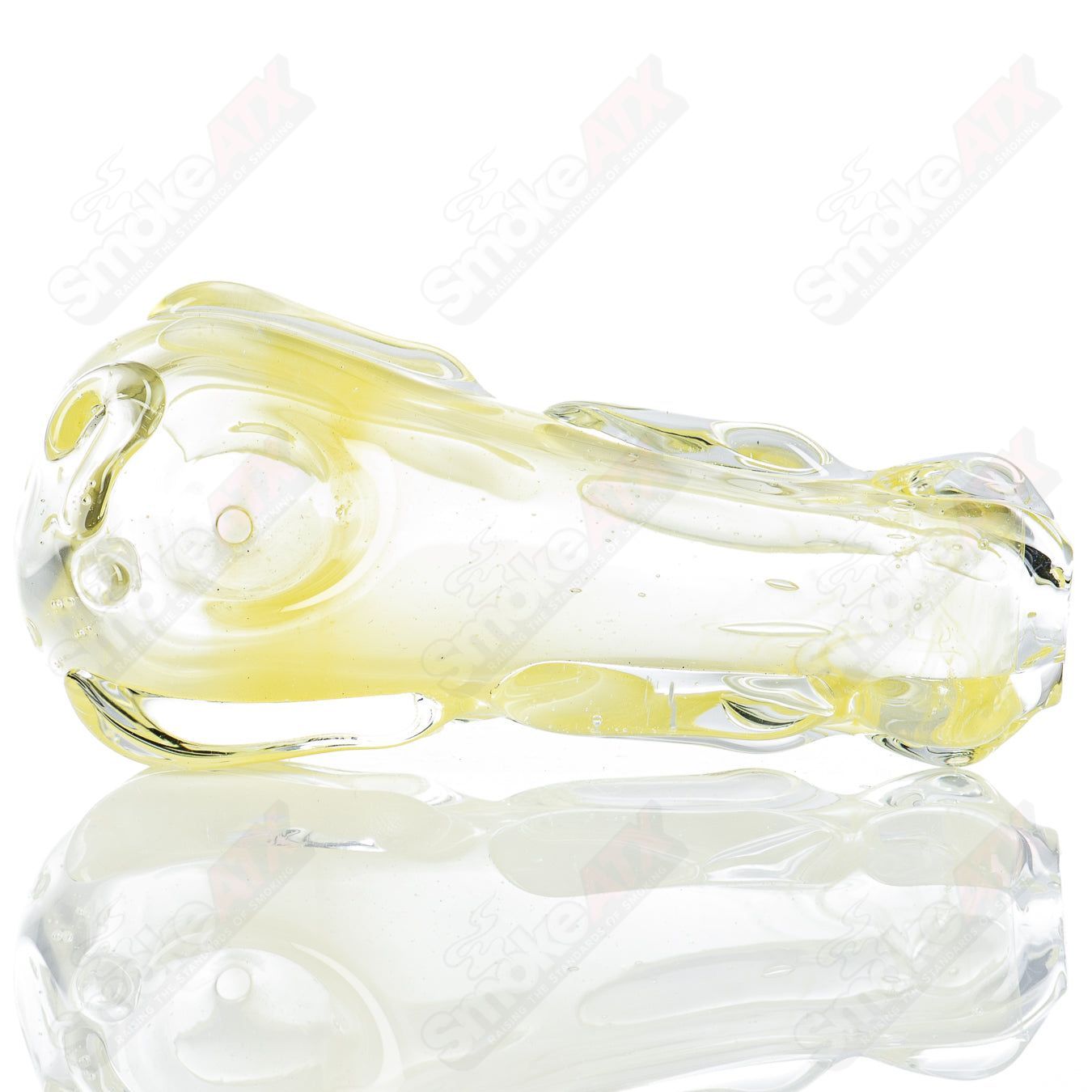 Glass pipe Spoon Glass by Nobody, clear and smooth with a rounded bowl and stem, designed for smoking purposes.