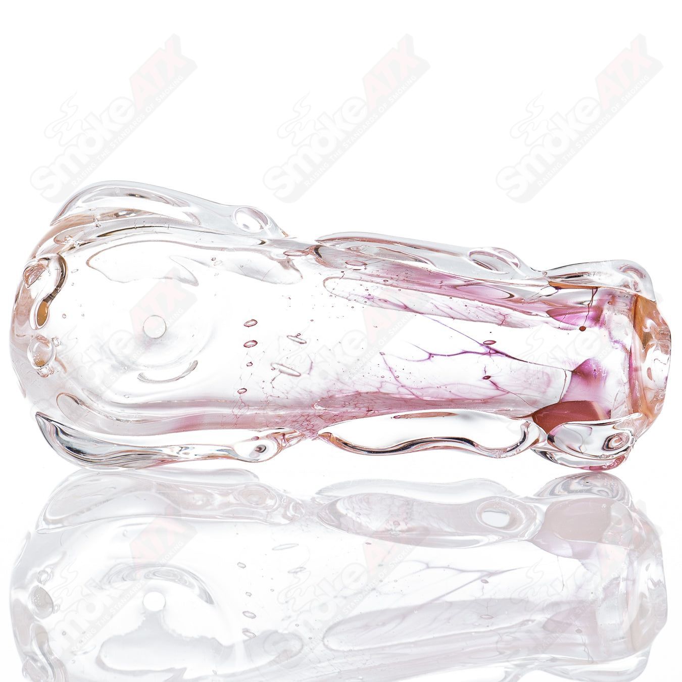 Clear glass spoon pipe by Nobody with a smooth, rounded bowl and a sleek, minimalist design for smoking accessories.