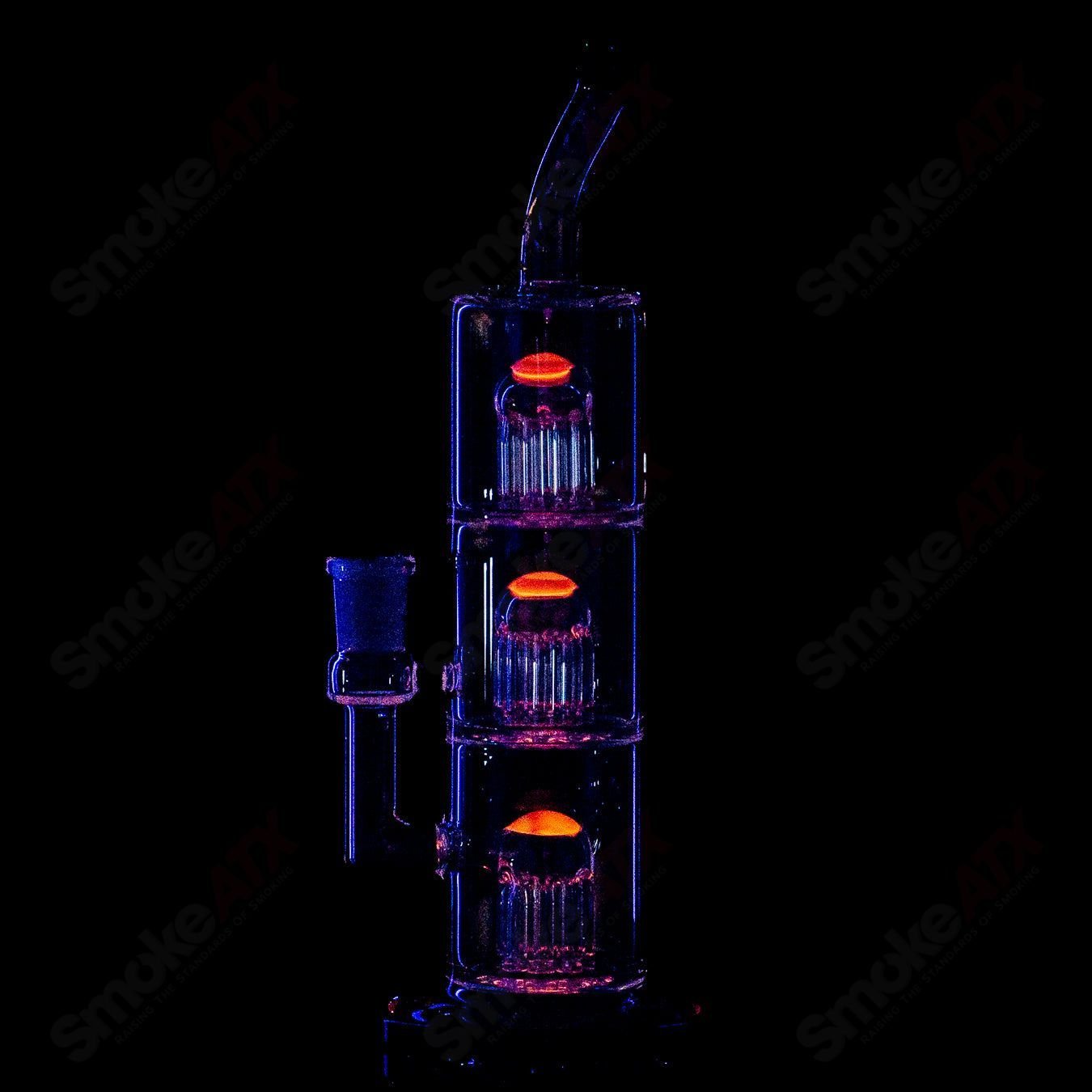 Toro Glass 10mm Triple Macro Bubbler with intricate glasswork and smooth mouthpiece, designed for enhanced smoking experience.