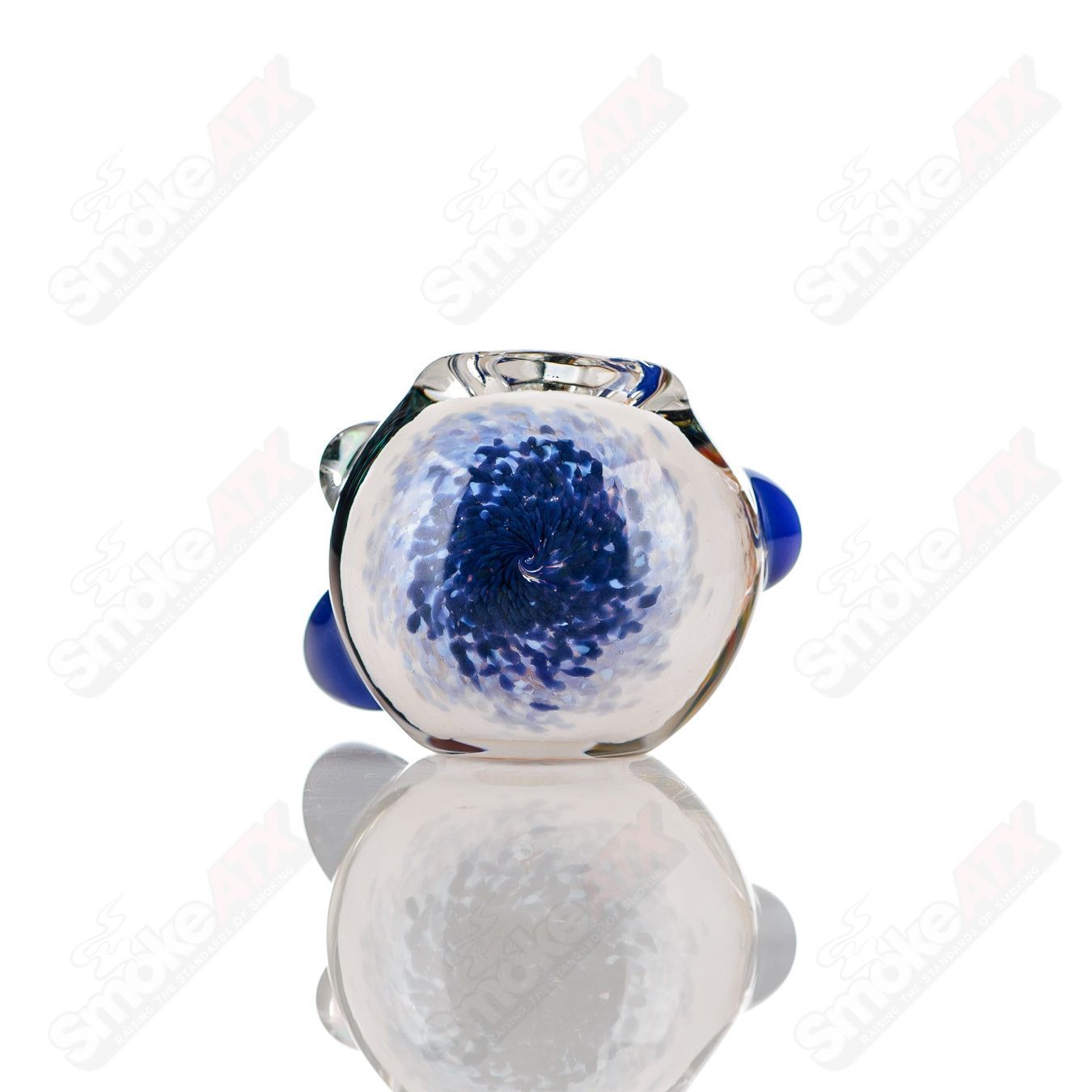 Color-worked IO spoon hand pipe by Jeremy from Oregon with vibrant 11-color design and clear glass bowl.