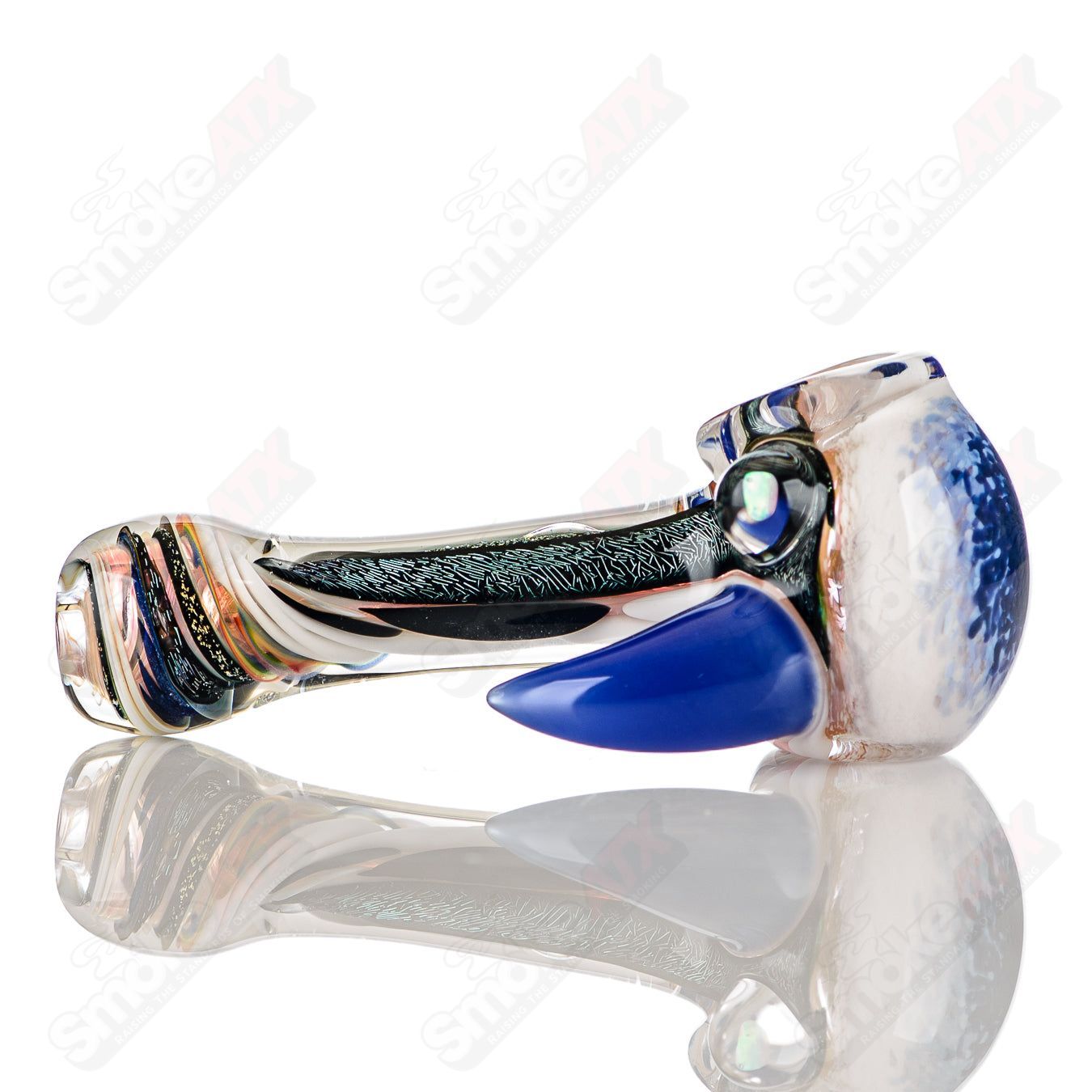 Color-worked IO spoon hand pipe by Jeremy from Oregon featuring intricate 11-color design and glass craftsmanship.