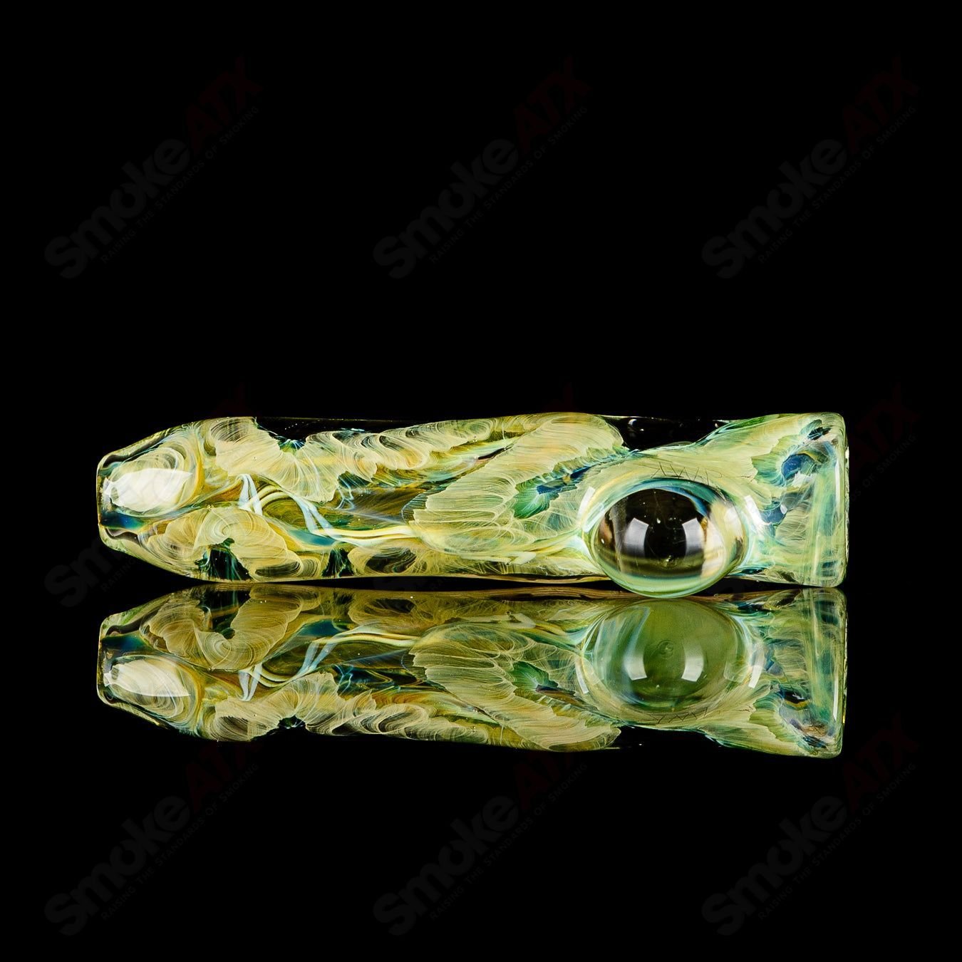 JMK Glass signed #11 I/O Worked Chillum, clear glass smoking pipe with intricate worked design and signature details.