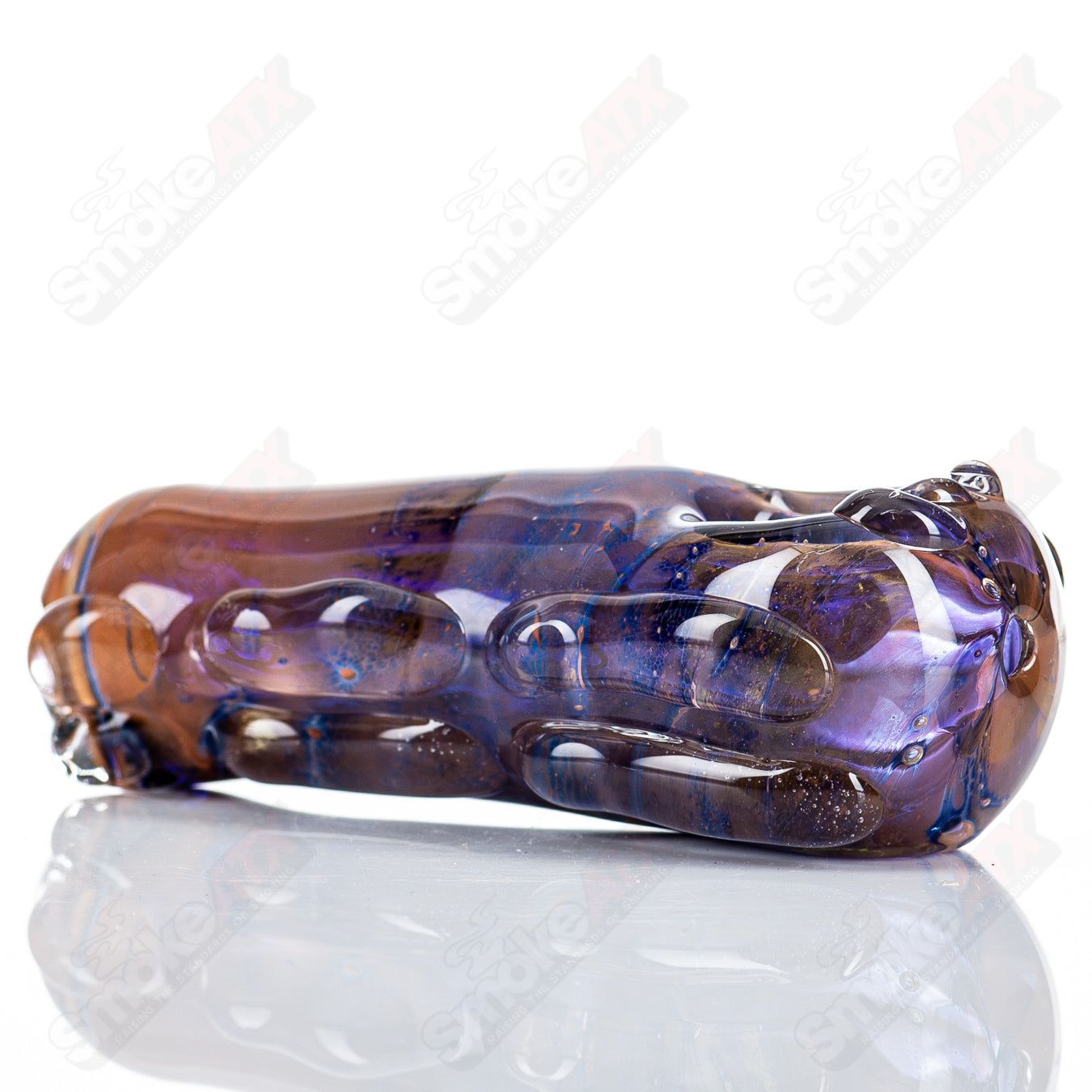Glass pipe called #110 Spoon Glass by Nobody, clear glass with a smooth bowl and elongated neck for smoking or vaporizing.