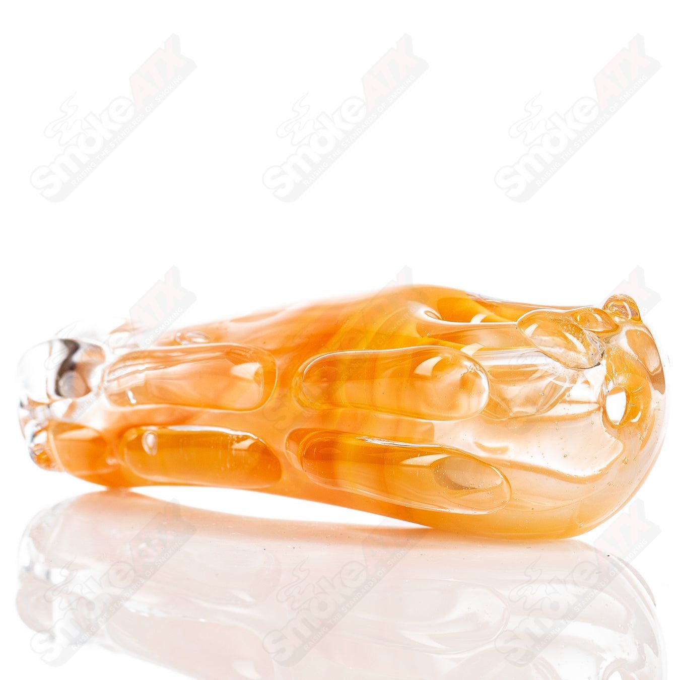 Glass pipe called Spoon Glass by Nobody, clear glass with a curved bowl and stem, designed for smoking.