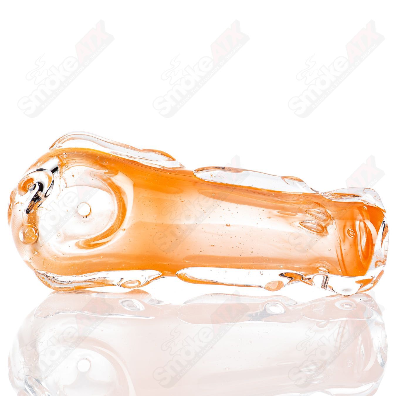 Clear glass spoon pipe by Nobody, featuring a smooth, rounded bowl and slender stem for easy handling.