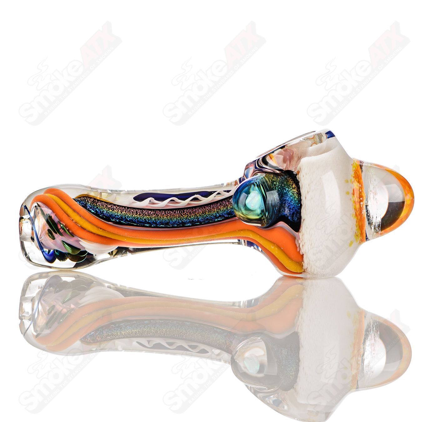 Color-worked IO spoon pipe by Jeremy from Oregon, handcrafted heady glass hand pipe with vibrant 12-color design.