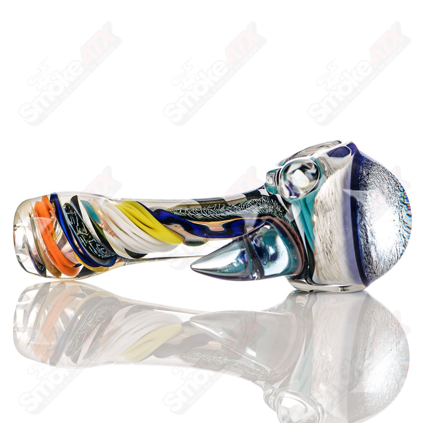 Colorfully worked IO spoon hand pipe by Jeremy from Oregon featuring vibrant 13-color design and smooth glass finish.