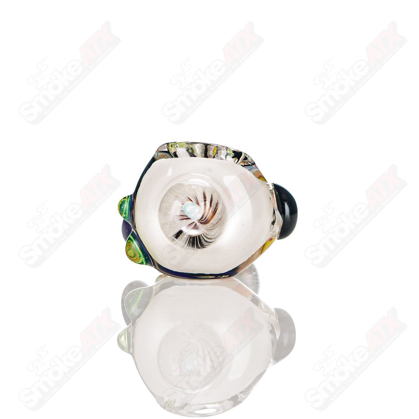 Colorfully worked IO spoon pipe by Jeremy from Oregon, hand-blown glass heady pipe with vibrant multicolor design.