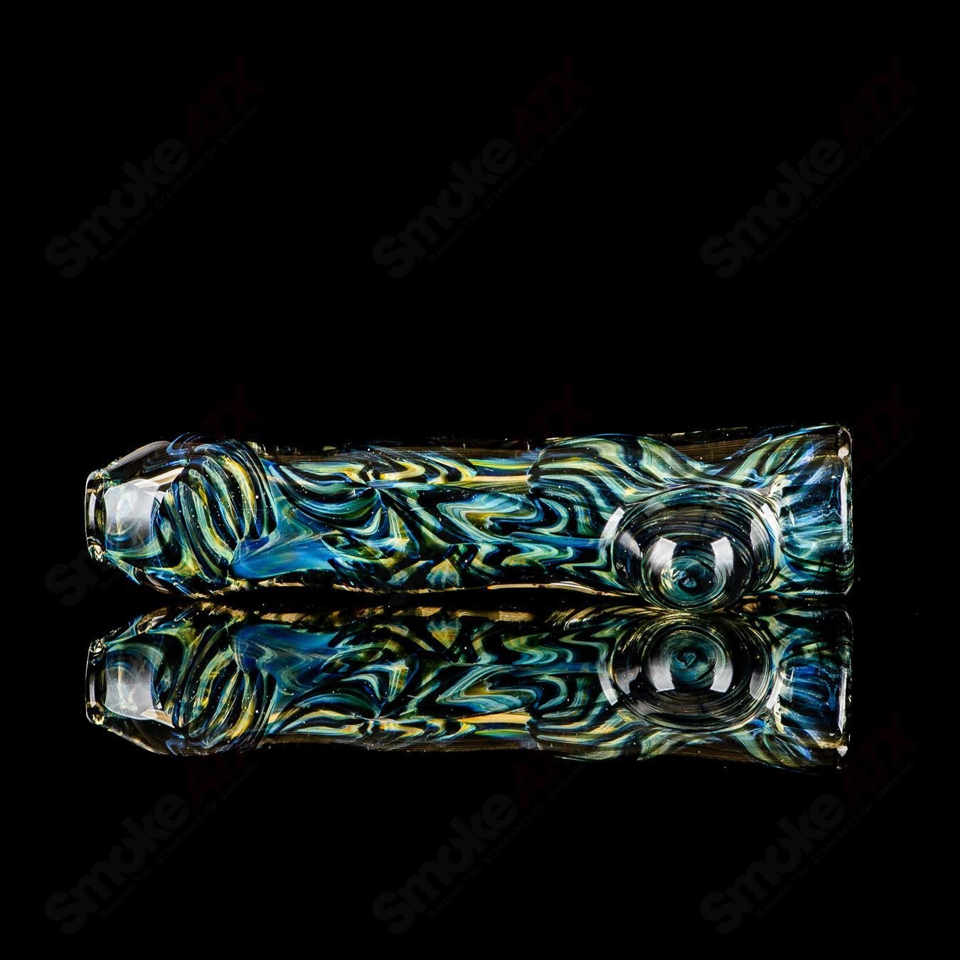 Signed JMK Glass #14 I/O Worked Chillum, clear glass smoking pipe with intricate worked design and logo details.
