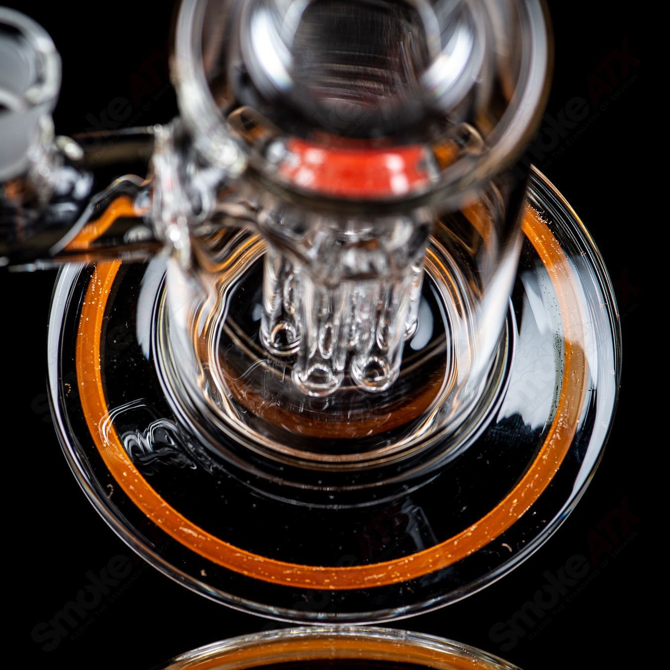 14mm Toro glass mini tree with color accents, straight tube bong showcasing vibrant glass details and a compact design.