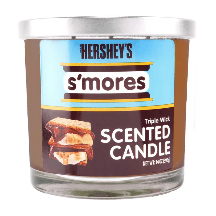 14oz Licensed Snacks scented candles featuring colorful snack-themed packaging and decorative wax, designed for aromatic ambiance.