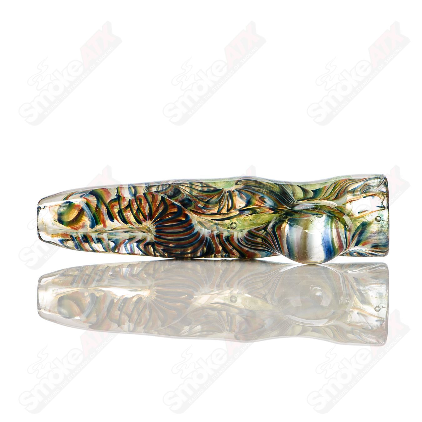 Glass chillum with intricate I/O worked design and signed by JMK Glass, showcasing detailed craftsmanship and clear glass construction.