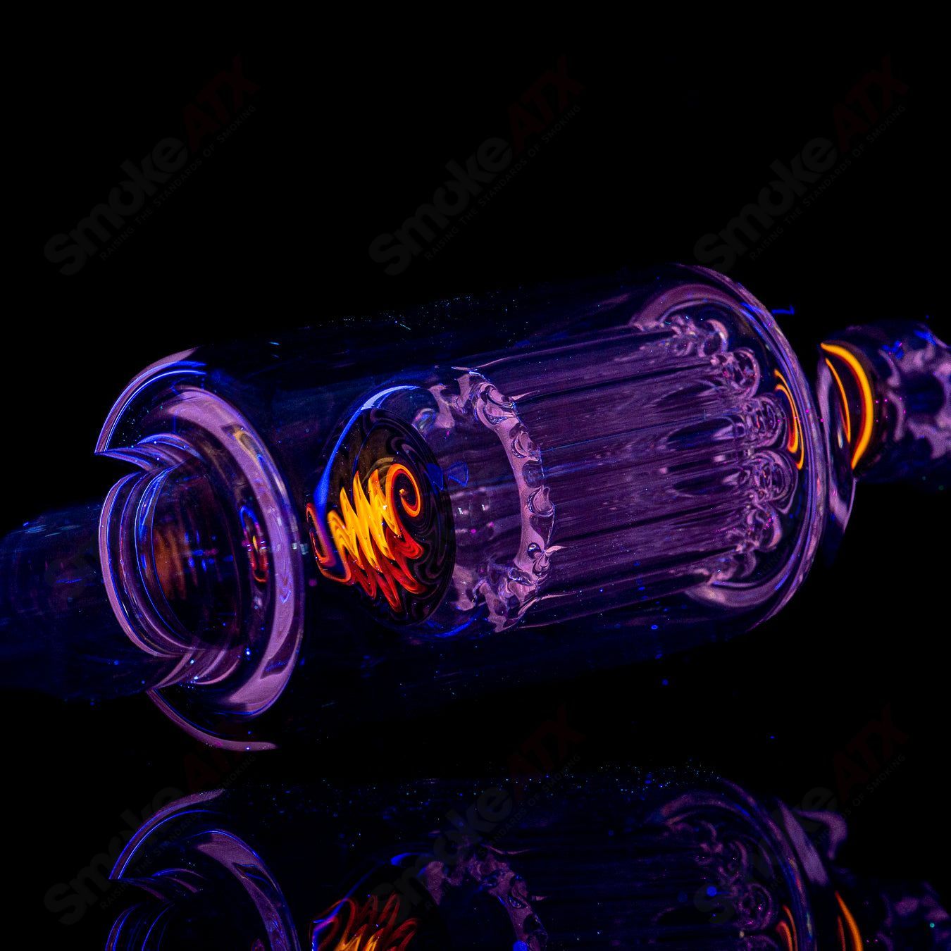 Toro 18mm 7/13 arm perc straight glass tube with worked sections, designed for smooth filtration and aesthetic appeal.