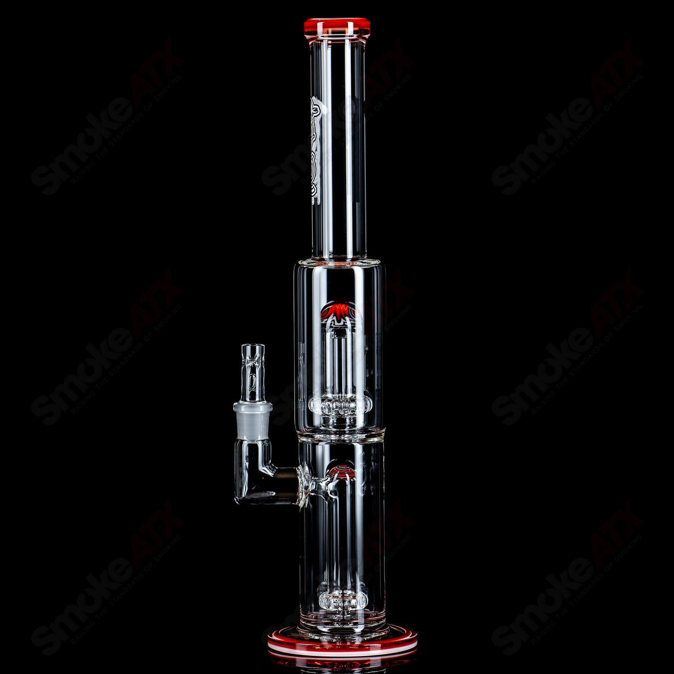 Toro Glass 18mm full-size straight glass tube with circular sections and reversal design, ideal for water pipes or bongs.