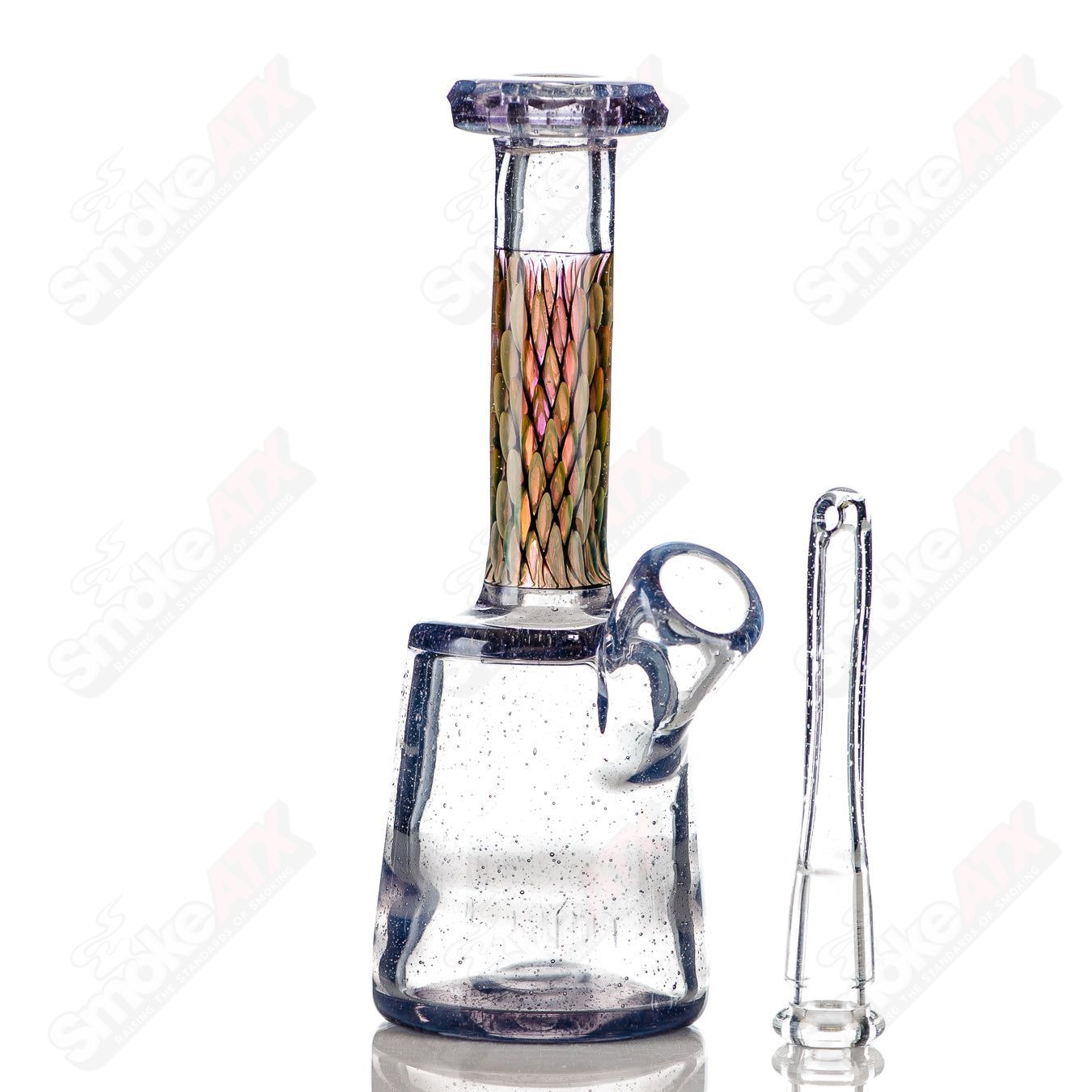 Faceted UV/CFL mini concentrate rig by BCM Glass, made of heady glass with colorful, textured facets for enhanced visual appeal.