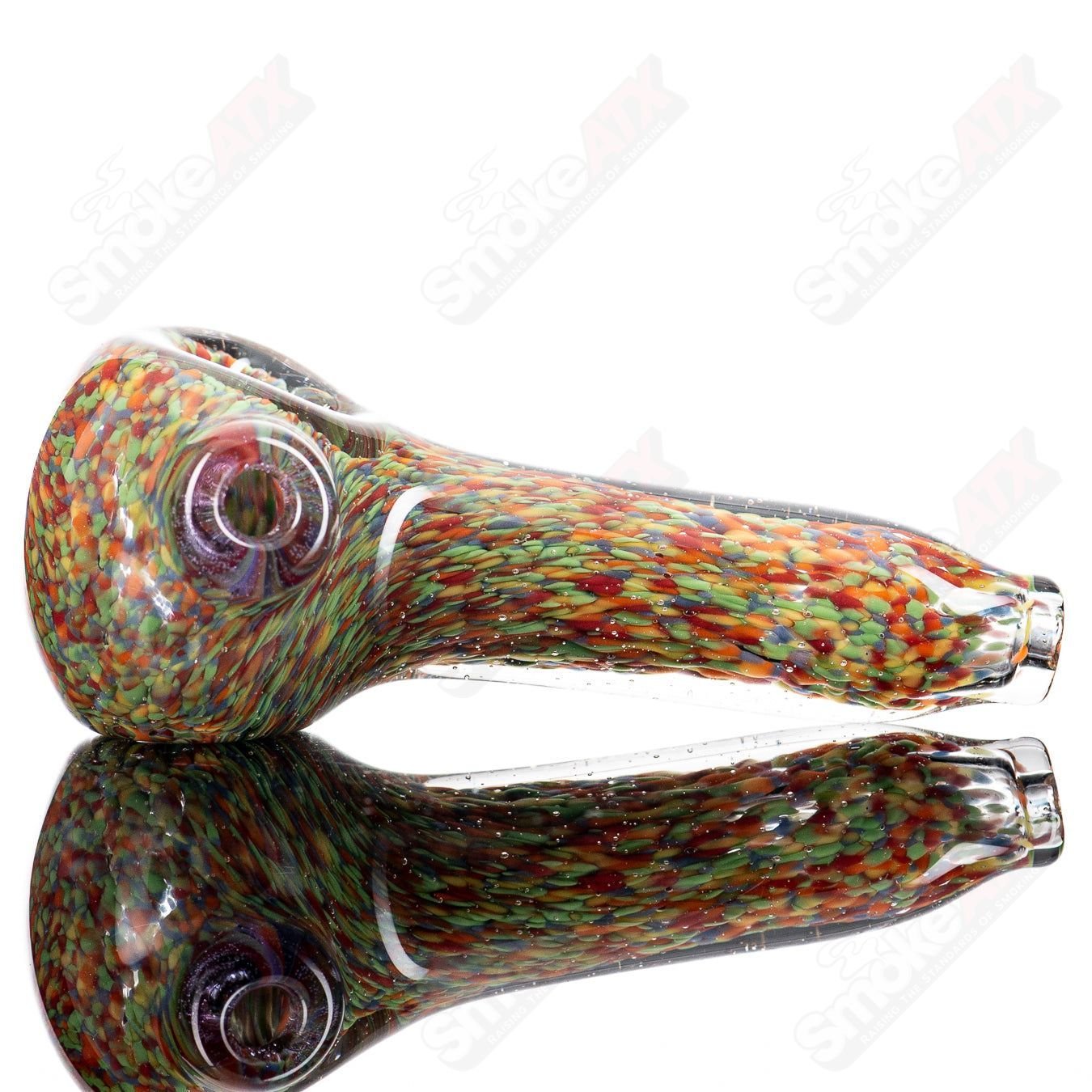 Colorful Frit Rainbow Spoon glass hand pipe by JMK Glass featuring vibrant rainbow frit accents and a smooth, ergonomic design.