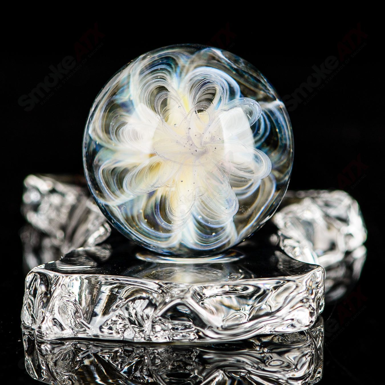 Fume Latticino marble signed JMK Glass heady glass marble with intricate swirling patterns and signature detail.