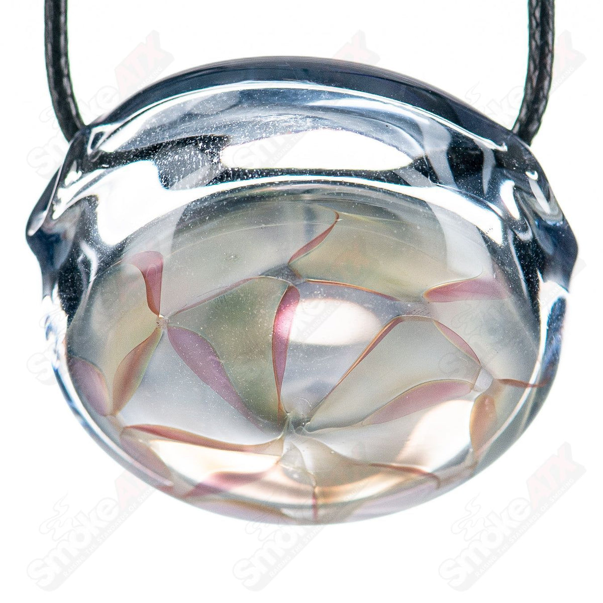 Fumed glass pendant necklace by Gurk featuring a sleek, artistic design with swirling smoky glass details.