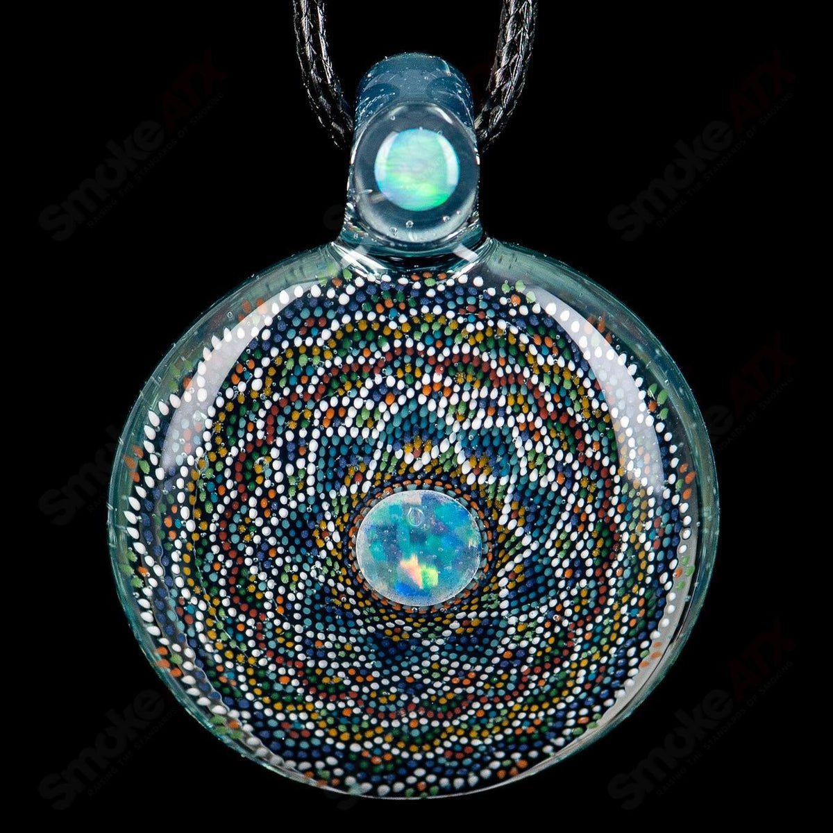 Colorful geometric glass pendant by JH Glassworks featuring vibrant shapes and a polished smooth surface.