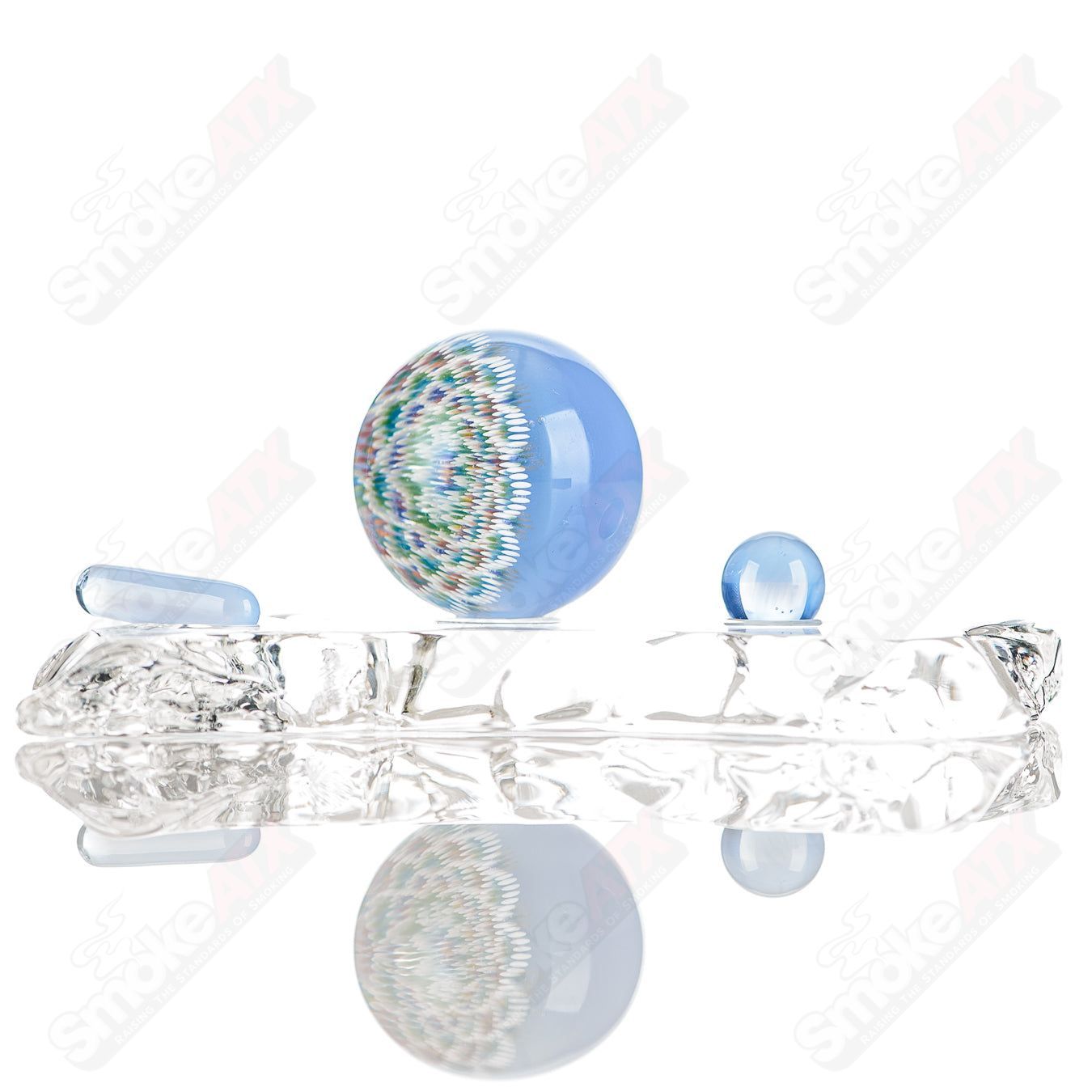 Geometric Slurper marble by JH Glassworks, heady glass piece with intricate marble design and vibrant colors.