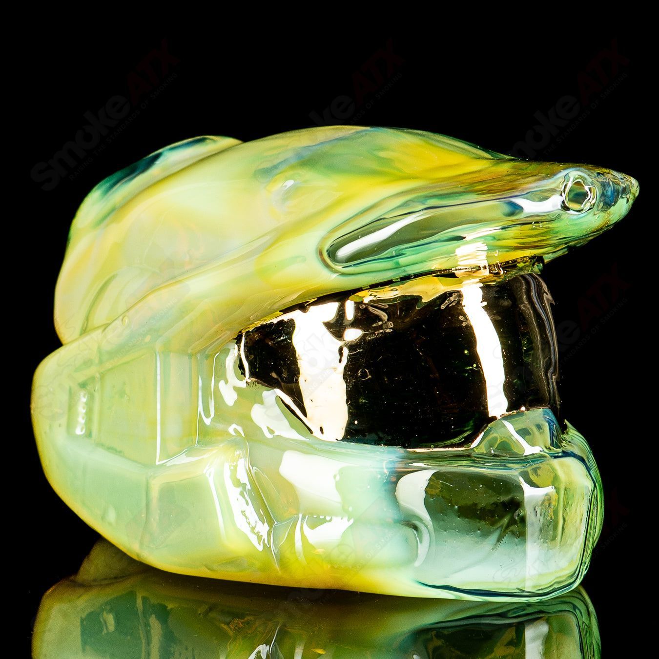 Heady glass concentrate rig featuring Halo Master Chief design by Tony Kazy, with detailed green and black accents, compact and collectible.